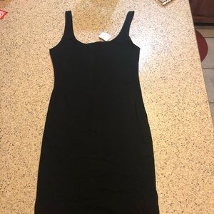Forever 21 black dress still has the tag on